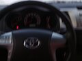2012 Toyota Hilux VII Рестайлинг, чёрный, 2050000 рублей - вид 4