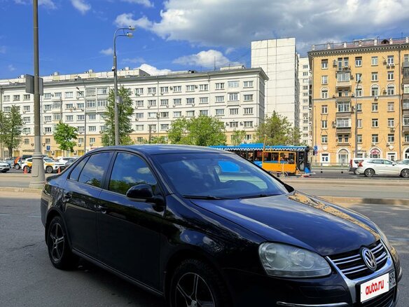 2009 Volkswagen Jetta V, чёрный - вид 1