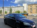 2009 Volkswagen Jetta V, чёрный - вид 1