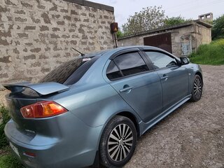 2008 Mitsubishi Lancer X, серый, 720000 рублей, вид 4