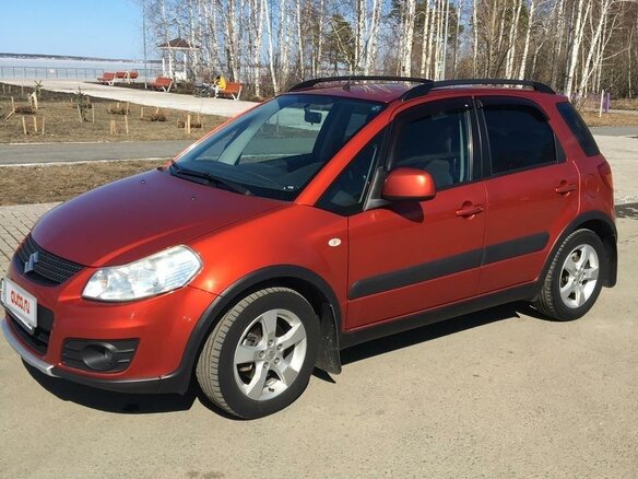 2011 Suzuki SX4 I (Classic) Рестайлинг, оранжевый