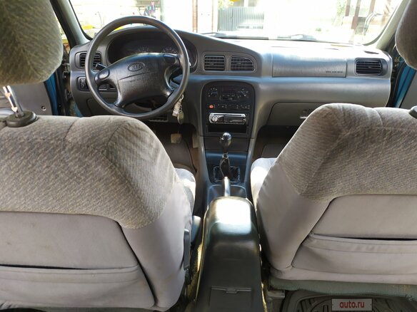 1999 Kia Clarus II, зелёный, 104437 рублей - вид 9
