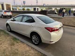 2013 Toyota Corolla XI (E160, E170, E180), белый, 1650000 рублей, вид 5