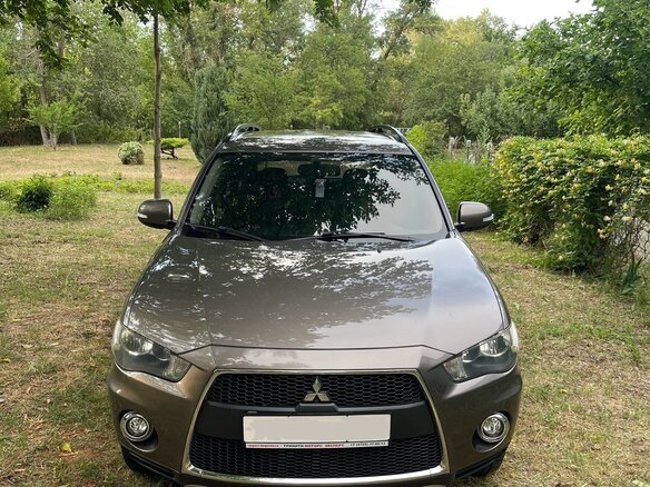 2012 Mitsubishi Outlander II Рестайлинг, коричневый, 1390000 рублей - вид 1
