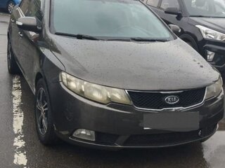 2010 Kia Cerato 5-speed II, коричневый, 505000 рублей, вид 1