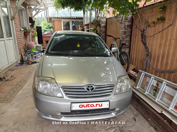 2003 Toyota Corolla IX (E120, E130), серебристый, 500000 рублей