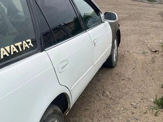1995 Toyota Corolla VIII (E110), белый, 290000 рублей, вид 2