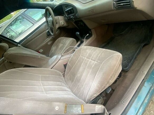 1995 Ford Taurus III, зелёный - вид 4