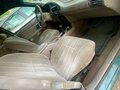 1995 Ford Taurus III, зелёный - вид 4