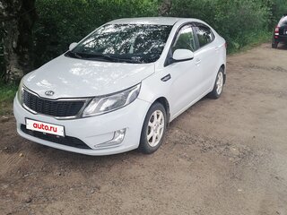 2011 Kia Rio 5-speed III, белый, 730000 рублей, вид 1