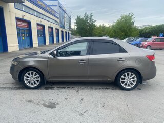 2009 Kia Cerato 4-speed II, серый, 820000 рублей, вид 4