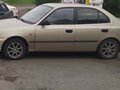 2007 Hyundai Accent ТагАЗ II, золотистый, 500000 рублей - вид 3