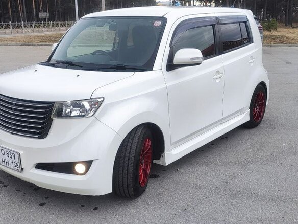2009 Toyota bB II Рестайлинг, белый, 850000 рублей - вид 1