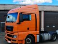 2014 MAN TGX, оранжевый, 3500000 рублей - вид 1
