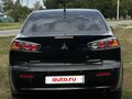 2010 Mitsubishi Lancer X, чёрный, 550000 рублей - вид 1