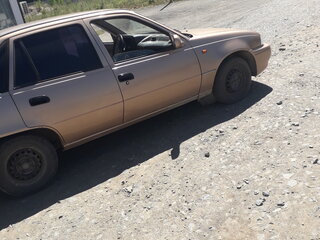 2001 Daewoo Nexia I, бежевый, 60000 рублей, вид 4