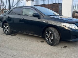 2008 Toyota Corolla X (E140, E150), чёрный, 600000 рублей, вид 2