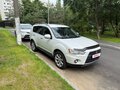 2011 Mitsubishi Outlander II Рестайлинг, белый, 1200000 рублей - вид 2
