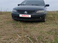 2007 Mitsubishi Lancer IX Рестайлинг, чёрный, 320000 рублей - вид 1