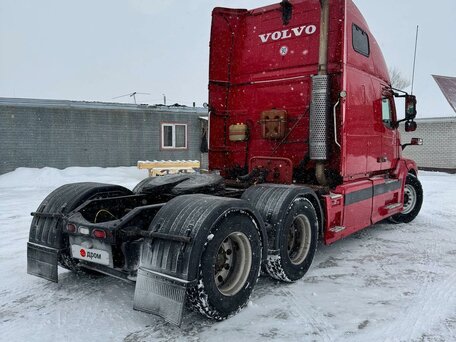 2003 Volvo VNL, пурпурный, 3200000 рублей, вид 1