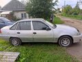 2012 Daewoo Nexia I Рестайлинг, серебристый, 145000 рублей - вид 1