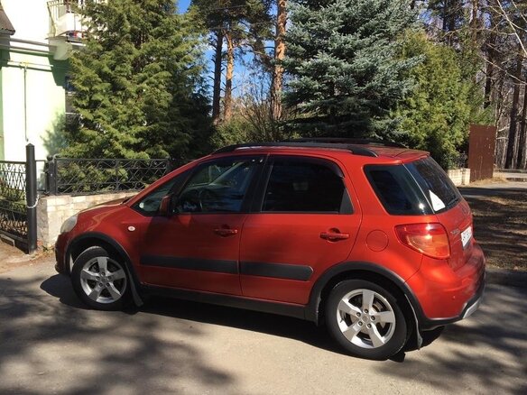 2011 Suzuki SX4 I (Classic) Рестайлинг, оранжевый - вид 5
