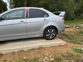 2011 Mitsubishi Lancer X Рестайлинг, серебристый, 450000 рублей, вид 4