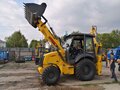 2023 New Holland B80B, жёлтый - вид 11