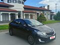 2012 Kia Rio 5-speed III, чёрный, 900000 рублей - вид 2