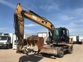 2013 Caterpillar M317, жёлтый