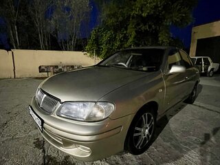 2002 Nissan Sunny N16, жёлтый, 349000 рублей, вид 2