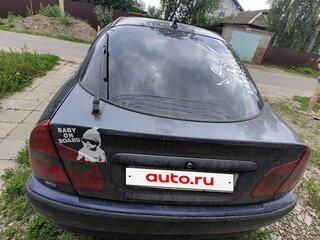 2001 Mitsubishi Carisma I Рестайлинг, синий, 245000 рублей, вид 4