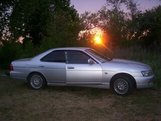 1997 Nissan Laurel VIII (C35), серебристый, 700000 рублей, вид 2