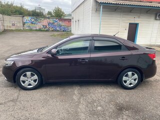 2011 Kia Cerato 6-speed II, пурпурный, 820000 рублей, вид 3