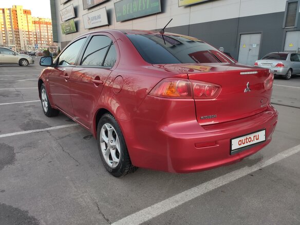 2008 Mitsubishi Lancer X, красный - вид 3