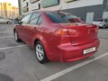 2008 Mitsubishi Lancer X, красный - вид 3