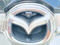 2010 Mazda Biante, серый, 1450000 рублей - вид 4