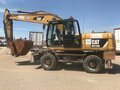 2013 Caterpillar M317, жёлтый - вид 7