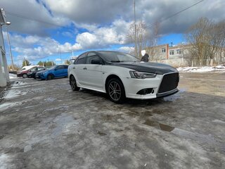 2010 Mitsubishi Lancer X, белый, 690000 рублей, вид 1