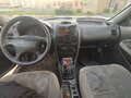 1997 Mitsubishi Carisma I, красный, 89000 рублей - вид 5