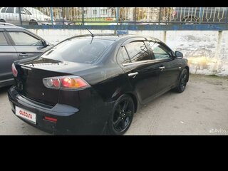 2012 Mitsubishi Lancer X Рестайлинг, чёрный, 800000 рублей, вид 2