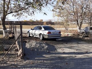 1998 BMW 7 серии 735i III (E38), белый, 850000 рублей, вид 3