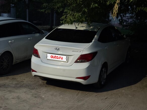 2014 Hyundai Solaris I Рестайлинг, белый, 635000 рублей - вид 4