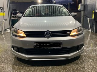 2014 Volkswagen Jetta VI Рестайлинг, серебристый, 1400000 рублей, вид 4
