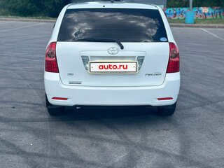 2004 Toyota Corolla Runx IX (E120, E130) Рестайлинг, белый, 645000 рублей, вид 5
