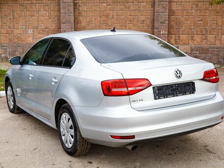 2015 Volkswagen Jetta VI Рестайлинг, серебристый, 1100000 рублей, вид 4