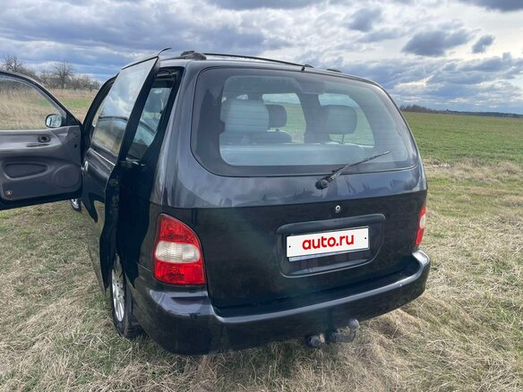 2000 Kia Carnival I, чёрный, 455913 рублей - вид 3