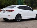 2016 Mazda Axela III Рестайлинг, белый, 1385000 рублей - вид 4