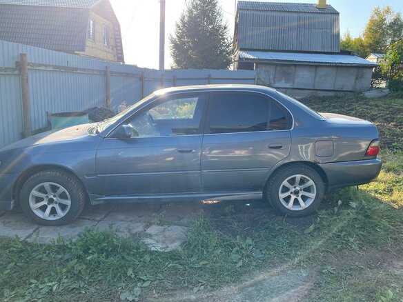 1992 Toyota Corolla VII (E100), синий - вид 5