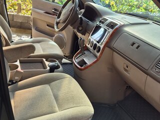 2005 Kia Carnival I Рестайлинг, чёрный, 900000 рублей, вид 3